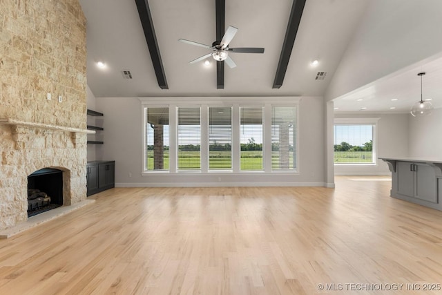 17537 S 56th E Ave, Bixby, OK 74008 - unfurnished living room with ceiling fan, a stone fireplace, high vaulted ceiling, beam ceiling, and light wood finished floors