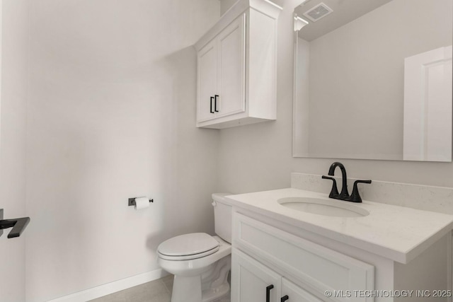 17537 S 56th E Ave, Bixby, OK 74008 - half bath featuring vanity, toilet, tile patterned flooring, and baseboards