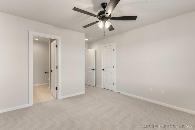 17537 S 56th E Ave, Bixby, OK 74008 - unfurnished bedroom featuring baseboards, light carpet, recessed lighting, ensuite bath, and a ceiling fan