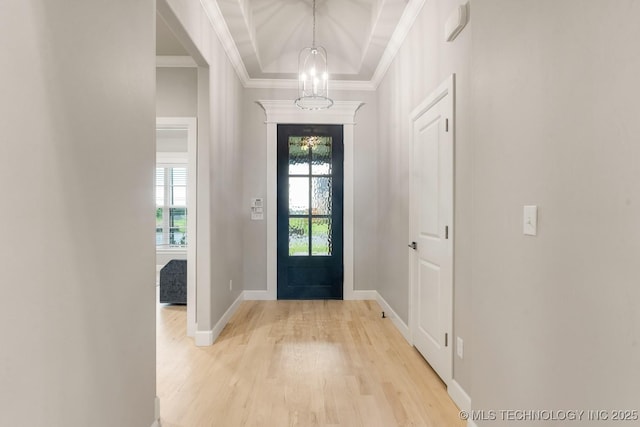 2708 W Van Buren Ct, Broken Arrow, OK 74134 - entrance foyer with a chandelier, light wood finished floors, and ornamental molding