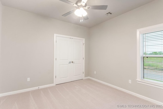 2708 W Van Buren Ct, Broken Arrow, OK 74134 - empty room with light carpet and ceiling fan