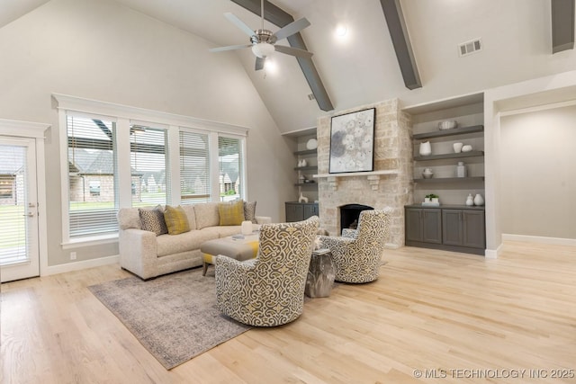 2708 W Van Buren Ct, Broken Arrow, OK 74134 - living area with high vaulted ceiling, a fireplace, wood finished floors, beamed ceiling, and a ceiling fan
