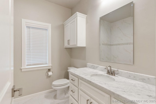 2708 W Van Buren Ct, Broken Arrow, OK 74134 - bathroom featuring vanity and marble look tile flooring