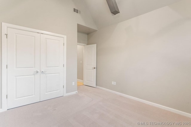 2708 W Van Buren Ct, Broken Arrow, OK 74134 - unfurnished bedroom with carpet flooring, a closet, and high vaulted ceiling