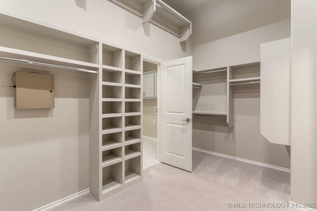 2708 W Van Buren Ct, Broken Arrow, OK 74134 - walk in closet featuring carpet floors
