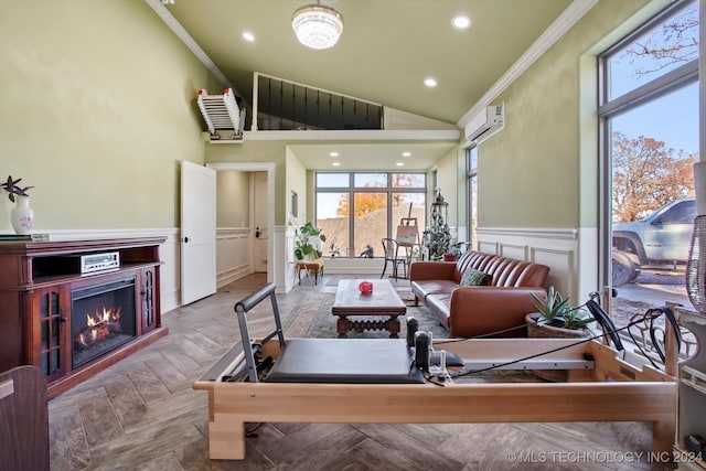 living room with a wall unit AC, ornamental molding, and a high ceiling