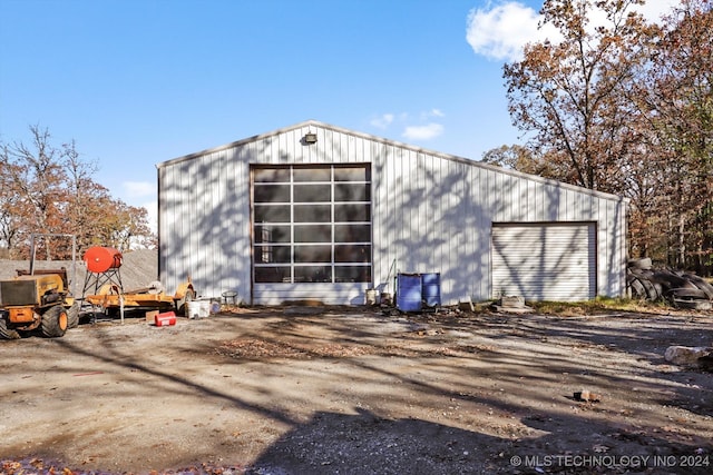 view of outdoor structure featuring a garage