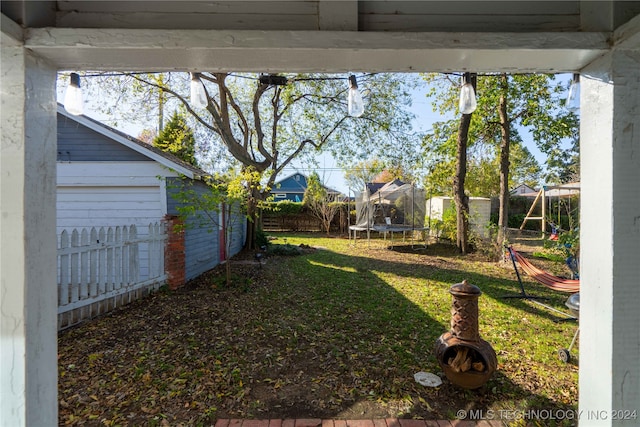 view of yard featuring a trampoline