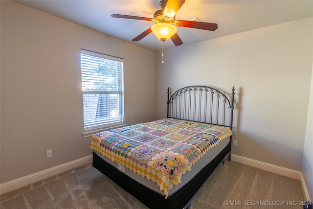 bedroom featuring carpet flooring and ceiling fan