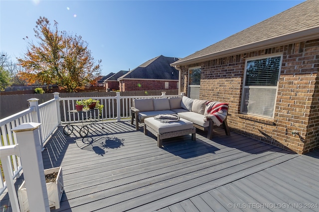 deck with outdoor lounge area