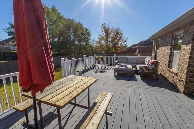 deck with an outdoor living space