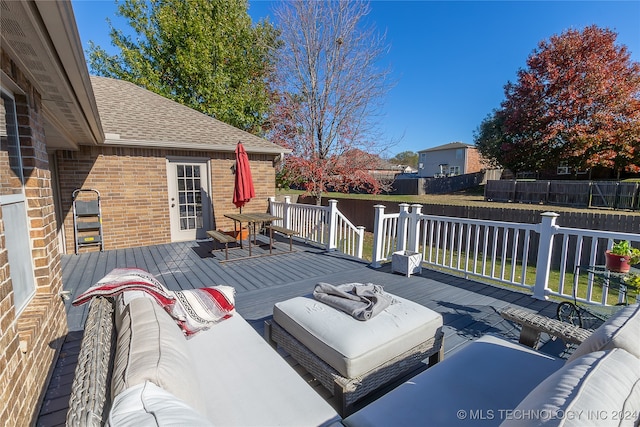 deck with an outdoor living space