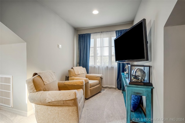 living area with carpet flooring