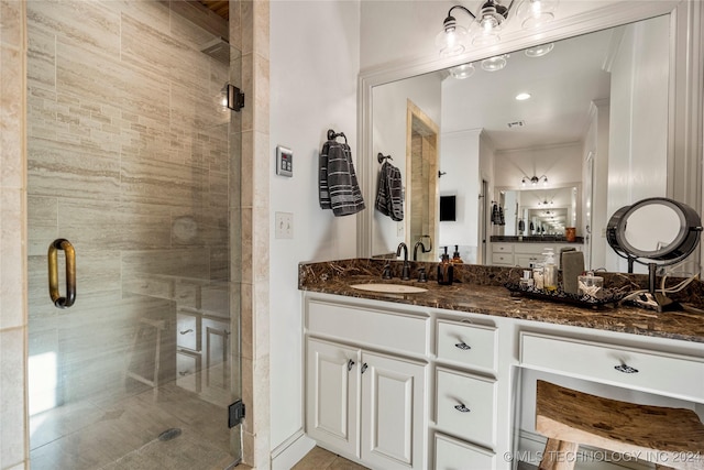 bathroom with vanity and walk in shower