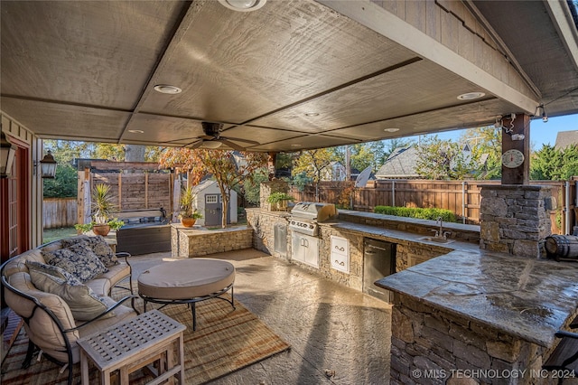 view of patio / terrace with area for grilling, exterior kitchen, and sink