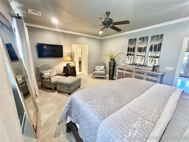 carpeted bedroom featuring ceiling fan and ornamental molding