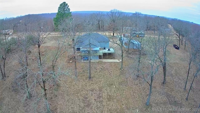 drone / aerial view featuring a mountain view