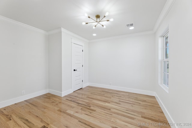 unfurnished room featuring a healthy amount of sunlight and wood-type flooring