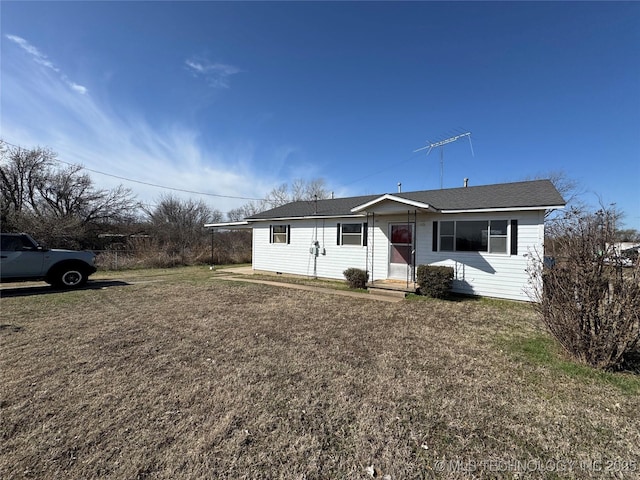 single story home featuring a front yard