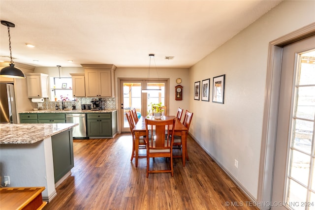 dining room featuring dark wood-type flooring