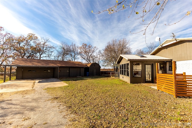 exterior space with a carport