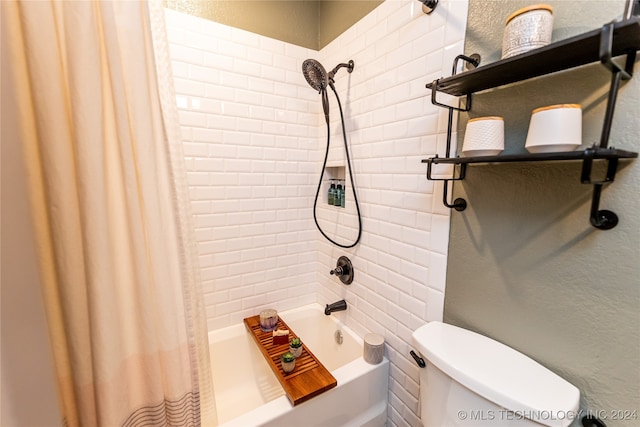 bathroom featuring toilet and shower / tub combo