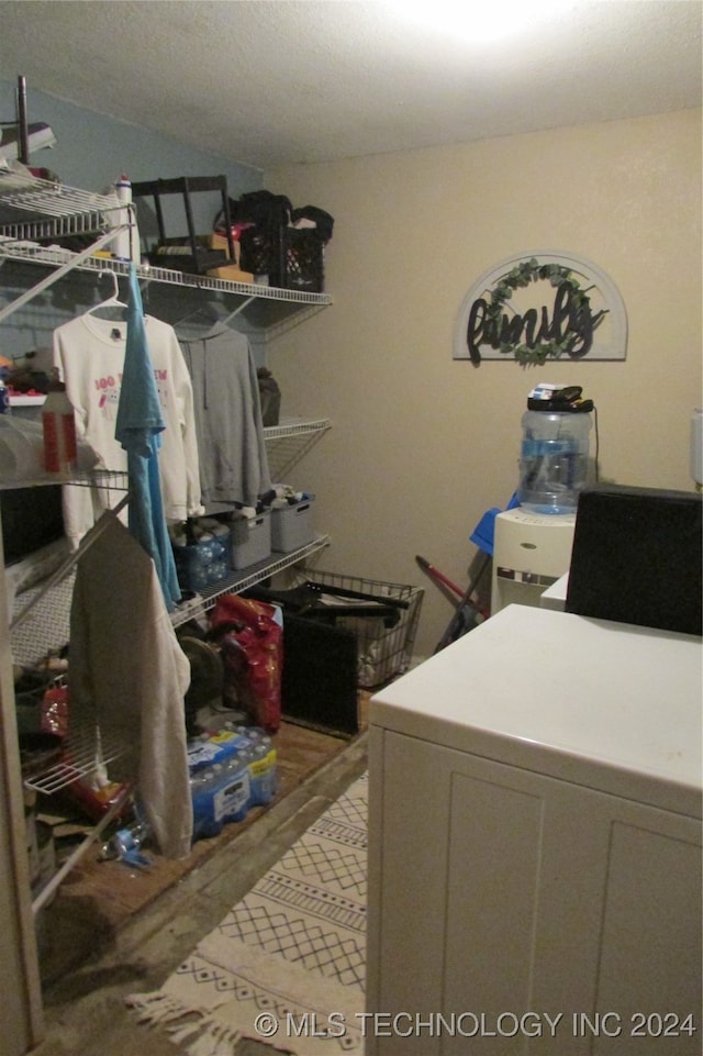 laundry room featuring hardwood / wood-style floors