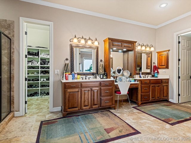 bathroom with walk in shower, vanity, and crown molding