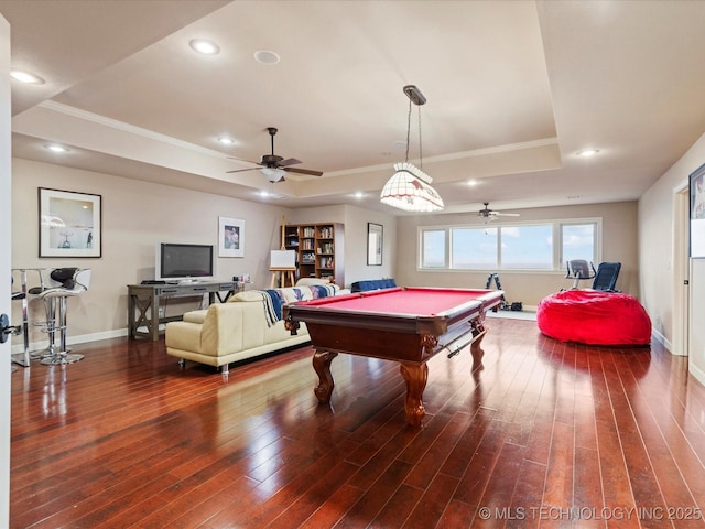 playroom featuring billiards, ornamental molding, a raised ceiling, and hardwood / wood-style floors