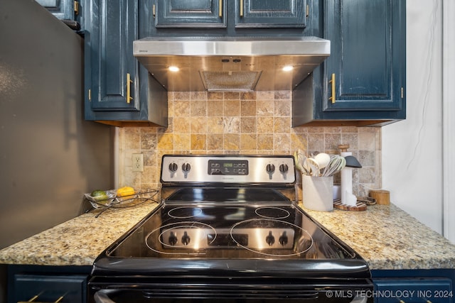 kitchen with stainless steel electric stove, decorative backsplash, ventilation hood, and blue cabinets