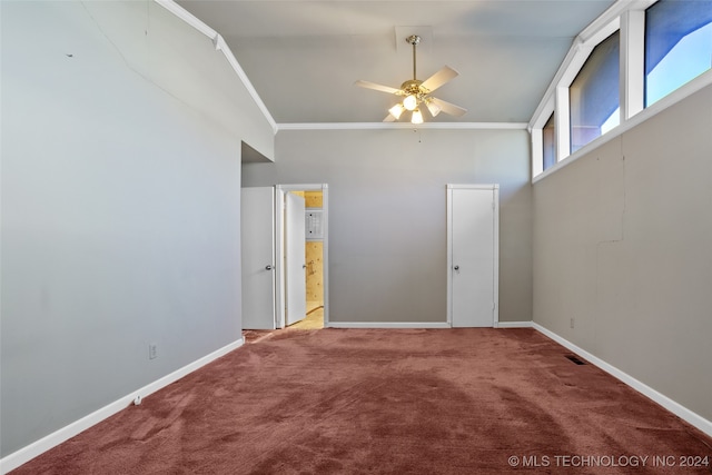 interior space with carpet flooring, ceiling fan, and crown molding