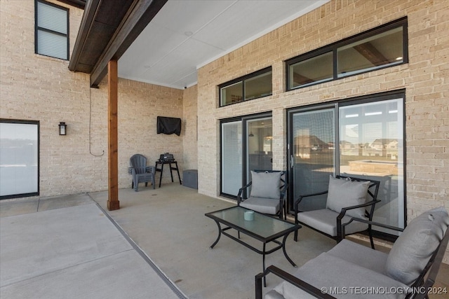 view of patio with an outdoor hangout area