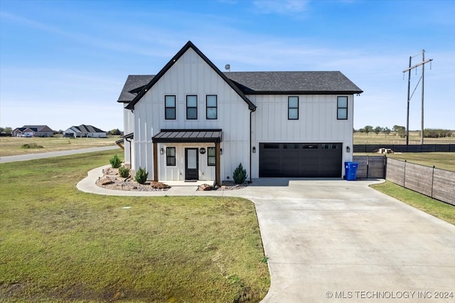 modern farmhouse style home with a front lawn and a garage