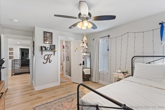 bedroom with ceiling fan and light wood-type flooring