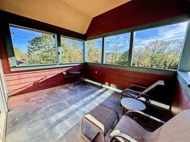 sunroom / solarium with plenty of natural light and lofted ceiling