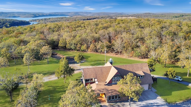 birds eye view of property with a mountain view