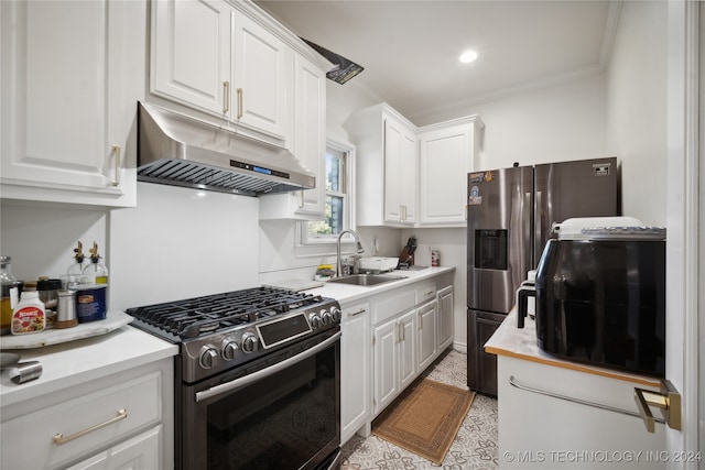 kitchen with sink, gas range oven, stainless steel refrigerator with ice dispenser, crown molding, and white cabinets