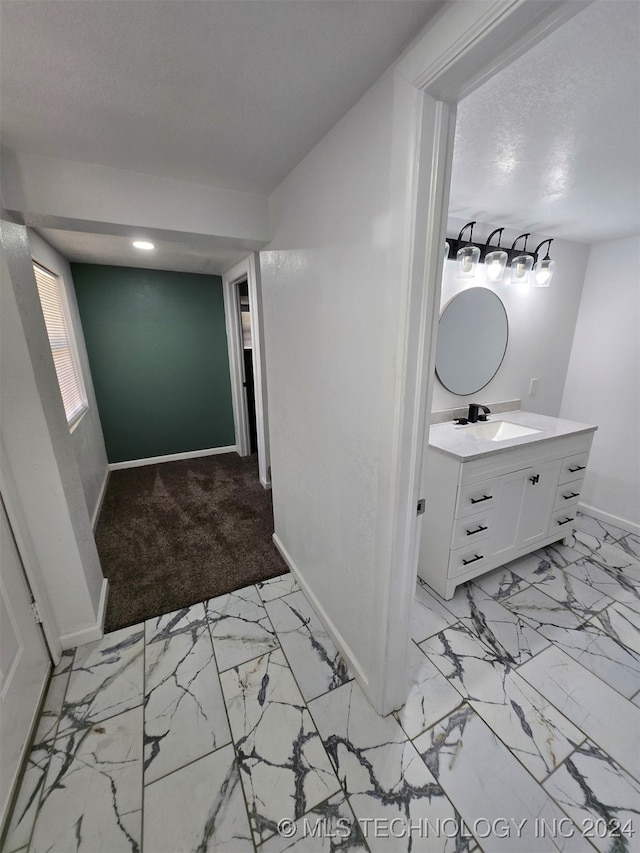 carpeted entryway featuring sink