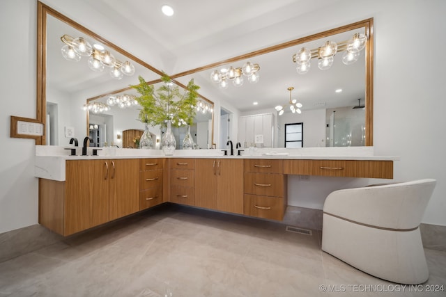 bathroom with a shower and vanity