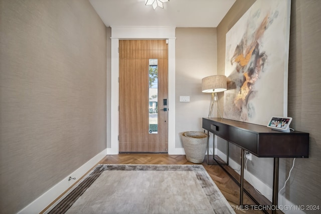 foyer entrance featuring parquet floors