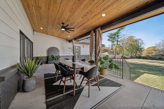 view of patio featuring ceiling fan