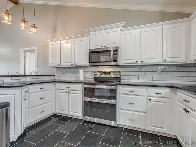 kitchen with white cabinets, backsplash, lofted ceiling, and stainless steel appliances