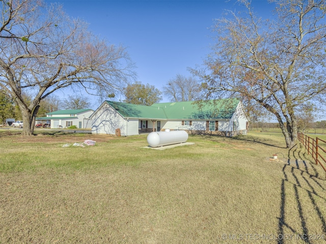 exterior space with a yard