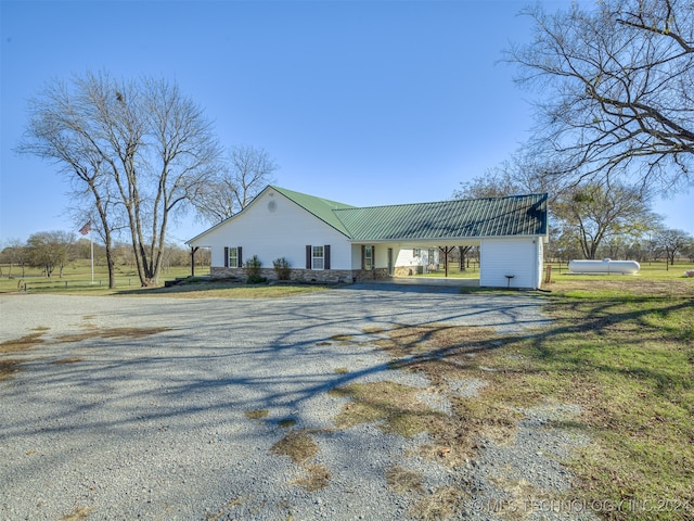 view of side of home featuring a carport