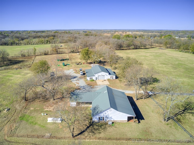 birds eye view of property with a rural view