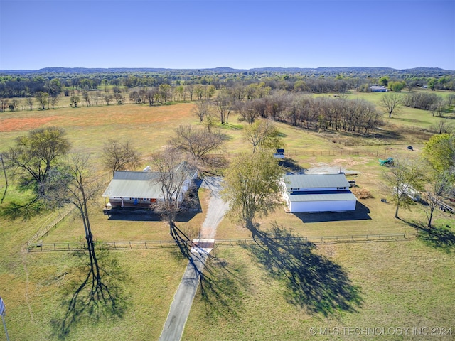 birds eye view of property featuring a rural view