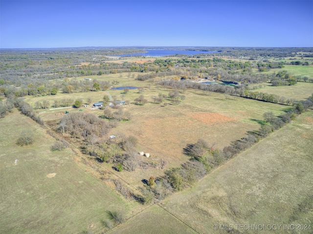 birds eye view of property featuring a rural view