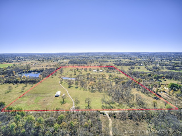 bird's eye view featuring a water view and a rural view