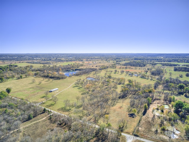 birds eye view of property featuring a rural view