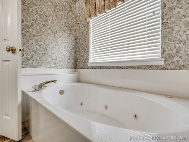 bathroom with a tub